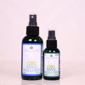 A bottle of cbd oil next to another bottle.