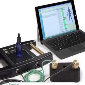 A laptop and other electronic devices on the table.